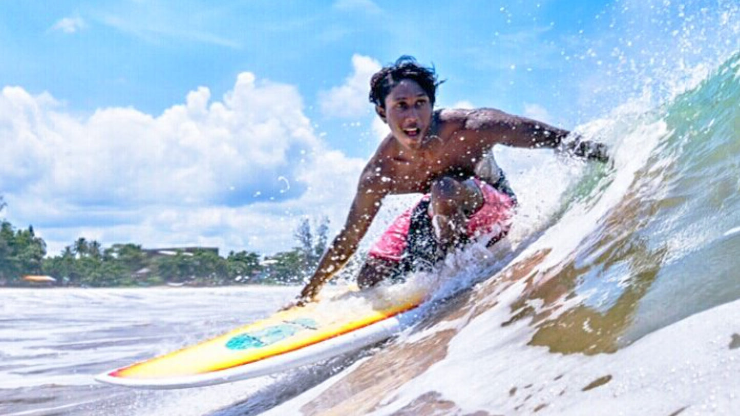 Weligama surf lessons with Anju, photo of surf instructor Anju surfing