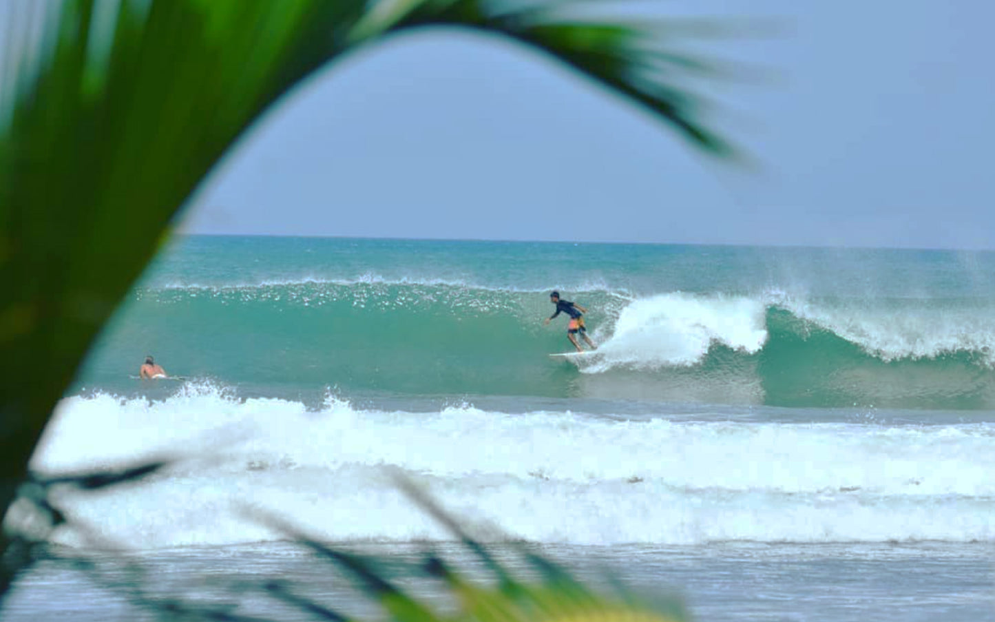 Arugam Bay surf lessons with Kannan, photo of surf instructor Kannan surfing 