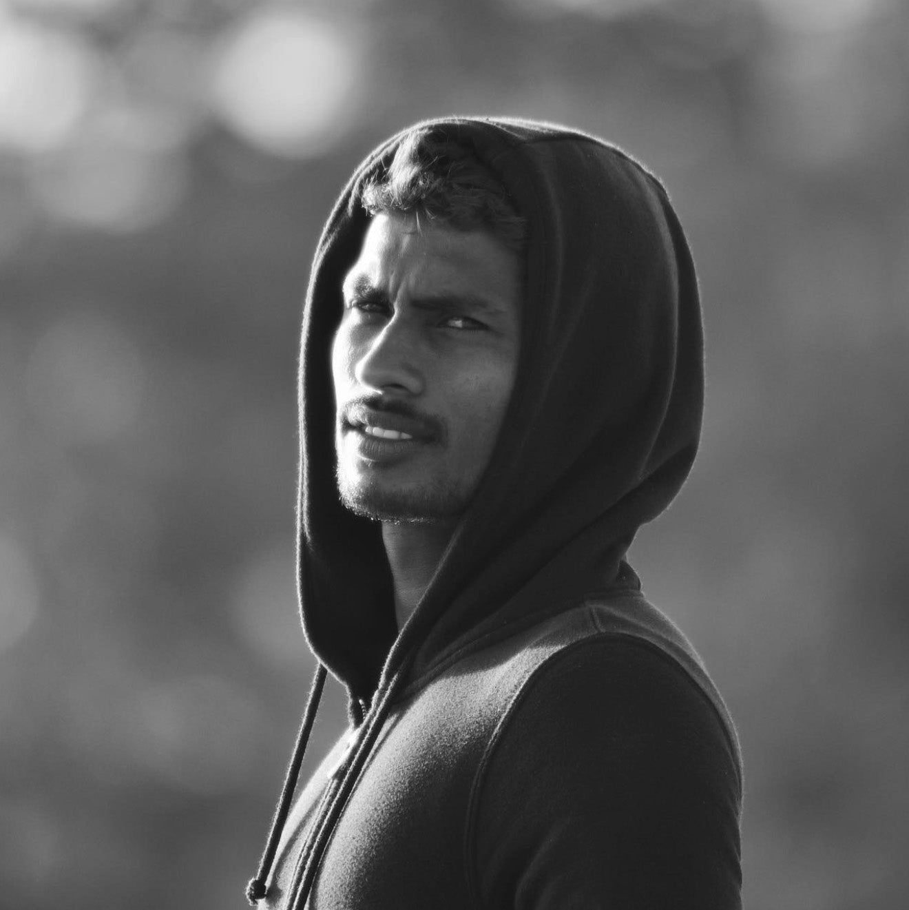 Arugam Bay surf lessons with Muzam, portrait of surf instructor Muzam