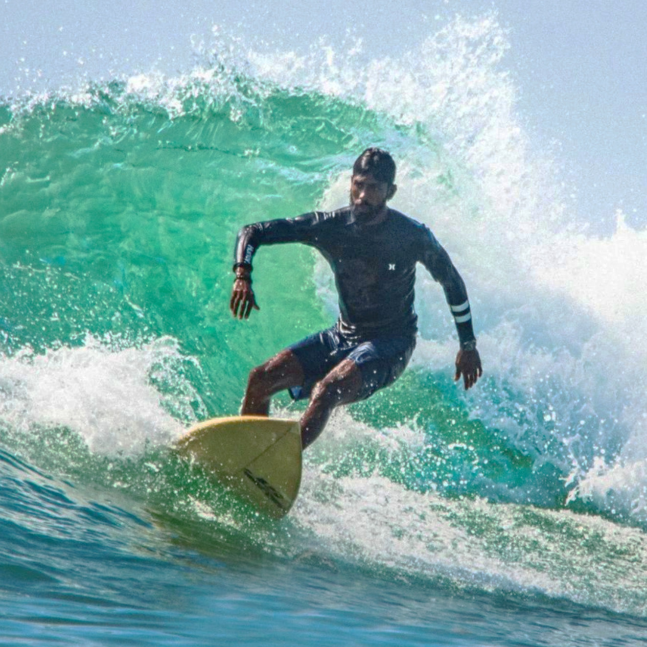 Weligama surf lessons with Nipuna, photo of surf instructor Nipuna surfing 