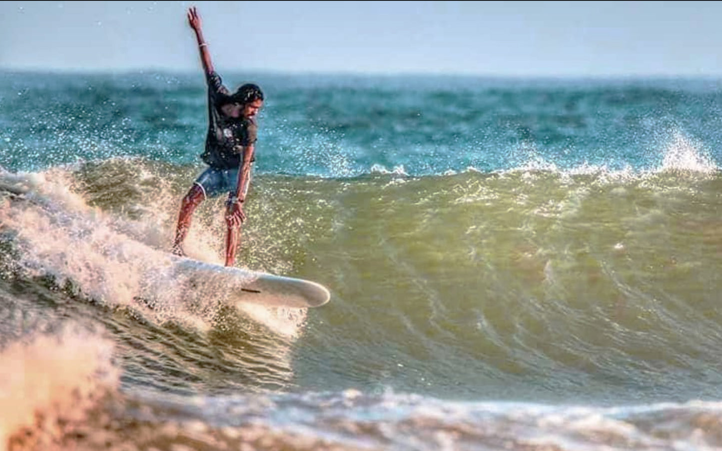 Weligama surf lessons with Nipuna, photo of surf instructor Nipuna surfing 2