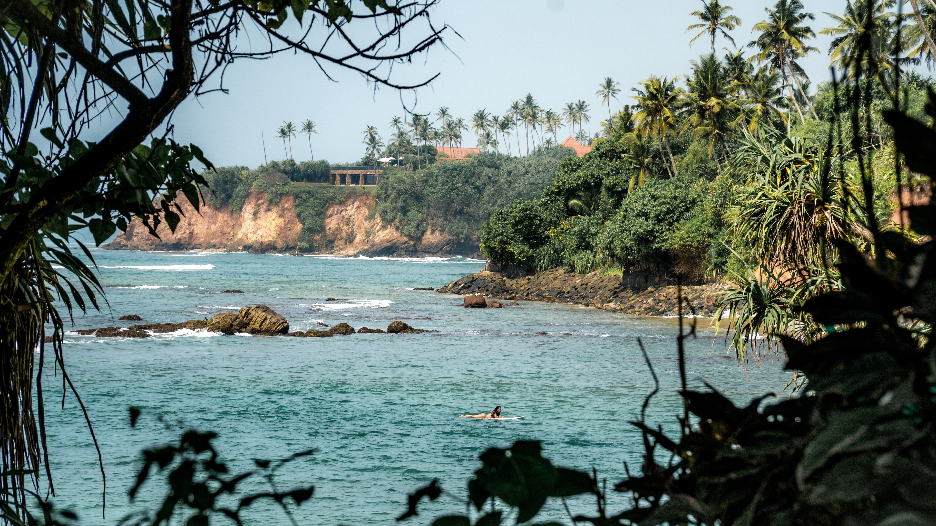 Photo of a girl surfing in Sri Lanka