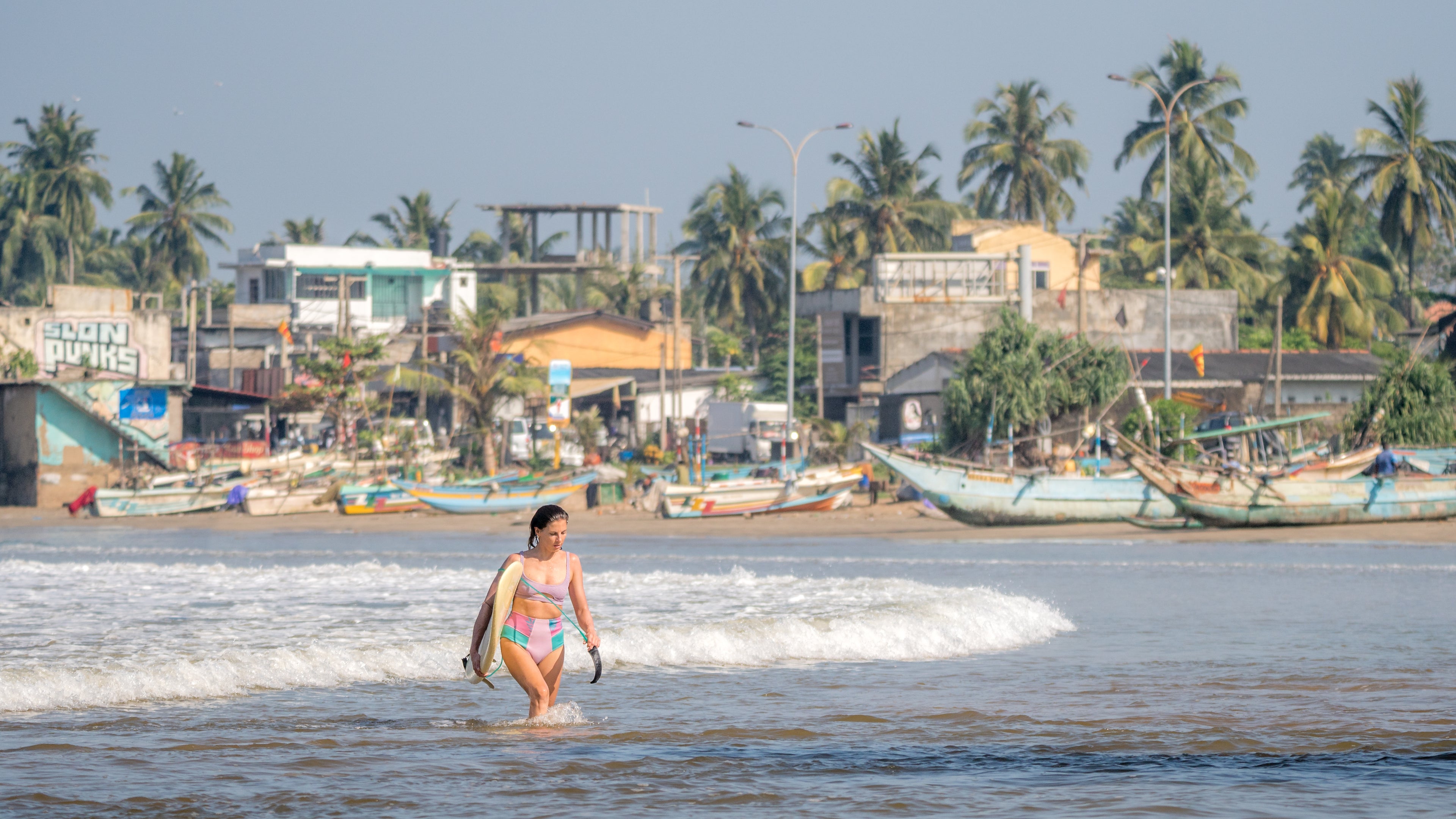 Photo of surfer girl Weligama Sri Lanka